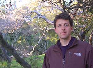 A photo of SF State Assistant Professor of Earth & Climate Sciences Alexander Stine.